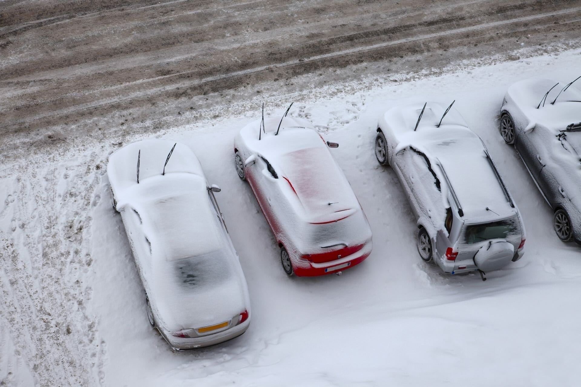 Parking Lot and cars covered in snow and ice